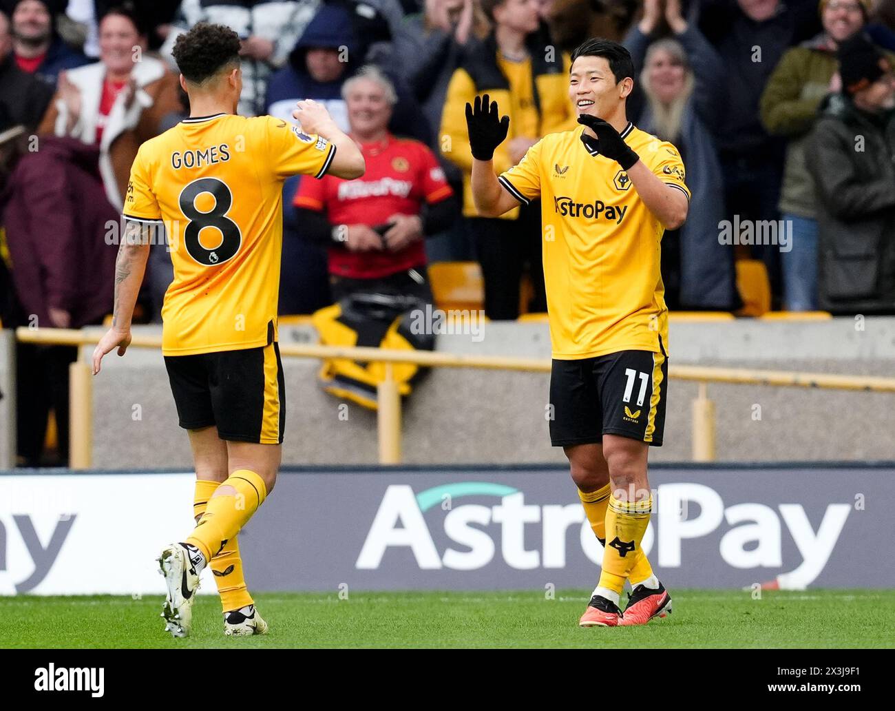 Wolverhampton Wanderers' Hwang Hee-Chan (right) celebrates with team-mate Joao Gomes after scoring the opening goal of the game during the Premier League match at Molineux Stadium, Wolverhampton. Picture date: Saturday April 27, 2024. Stock Photo