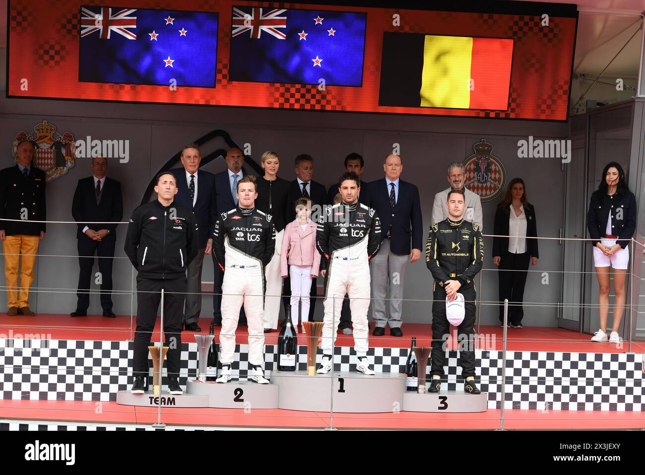 2024 Monaco E-Prix Round 8 MONTE CARLO, MONACO - APRIL 27: James Barclay, Team Director, Jaguar TCS Racing, Nick Cassidy, Jaguar TCS Racing, 2nd position,  Mitch Evans, Jaguar TCS Racing, 1st position, and Stoffel Vandoorne, DS Penske, 3rd position, on the podium during the Monaco E-Prix,  round 8 of the 2024 FIA Formula E World Championship at Circuit de Monaco on April 27, 2024 in Monte Carlo, Monaco. Stock Photo