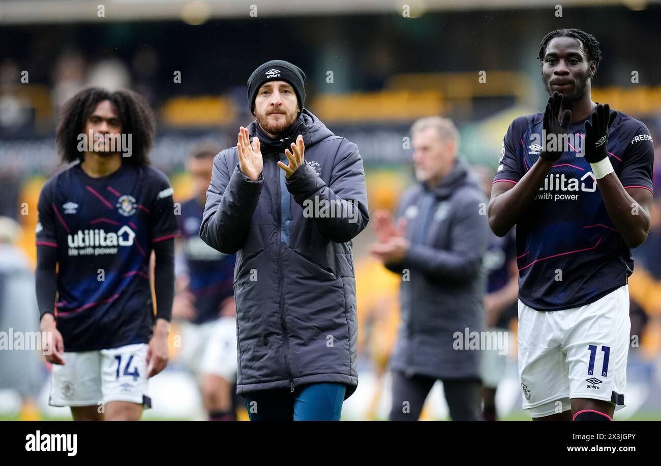 Luton Town's Tom Lockyer (centre) and team-mate Elijah Adebayo applaud the fans following the Premier League match at Molineux Stadium, Wolverhampton. Picture date: Saturday April 27, 2024. Stock Photo