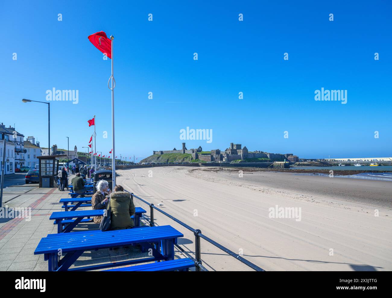 View from a seafront cafe towards Peel Castle, Peel, Isle of Man, England, UK Stock Photo