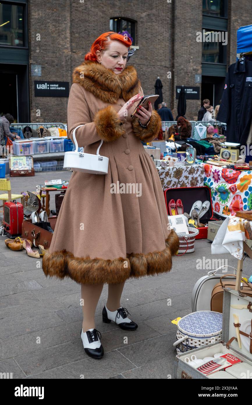 London, UK. 27 April 2024. A visitor wearing vintage clothes at the ...