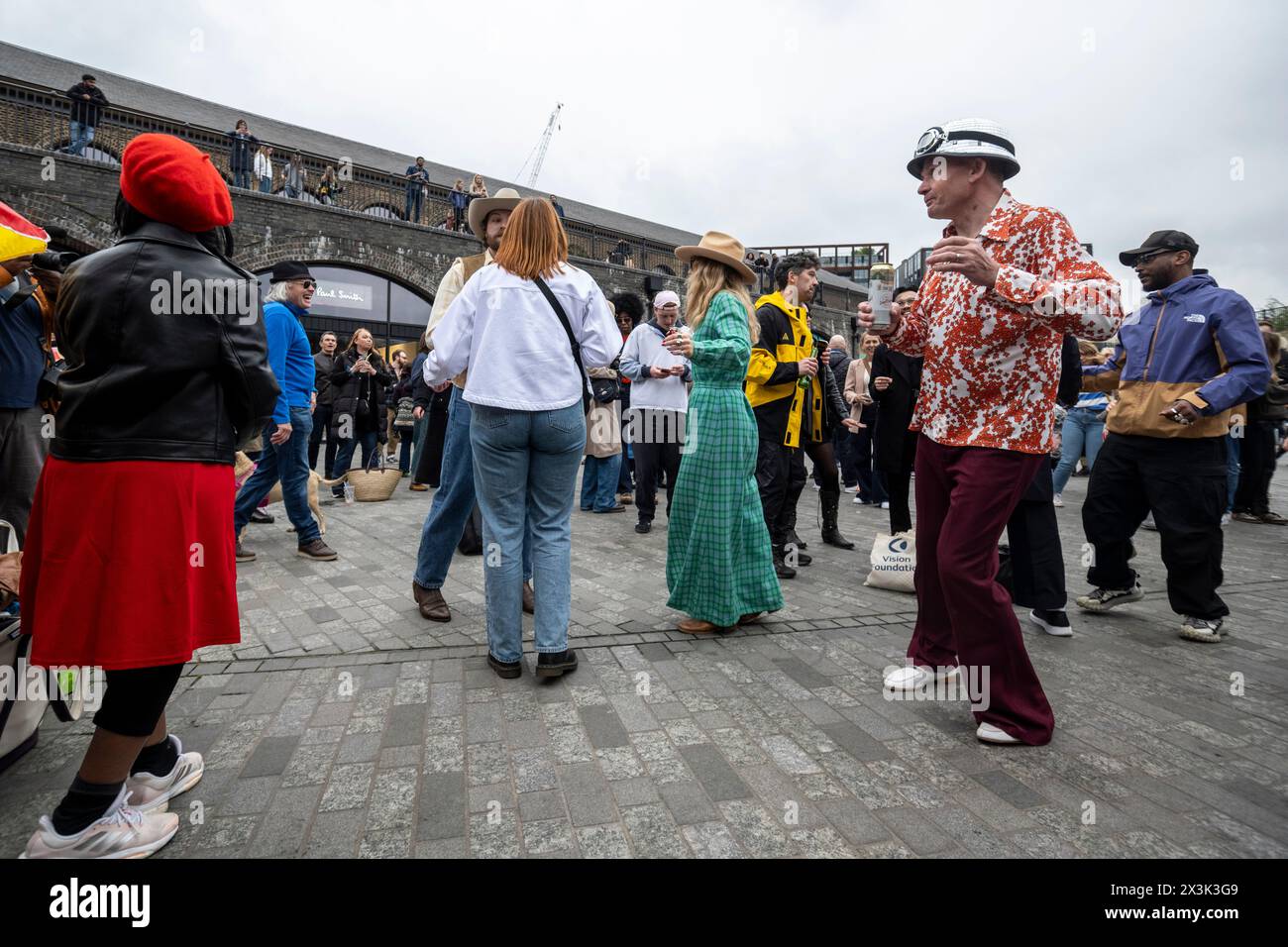 London, UK. 27 April 2024. People dance to sixties and seventies music ...