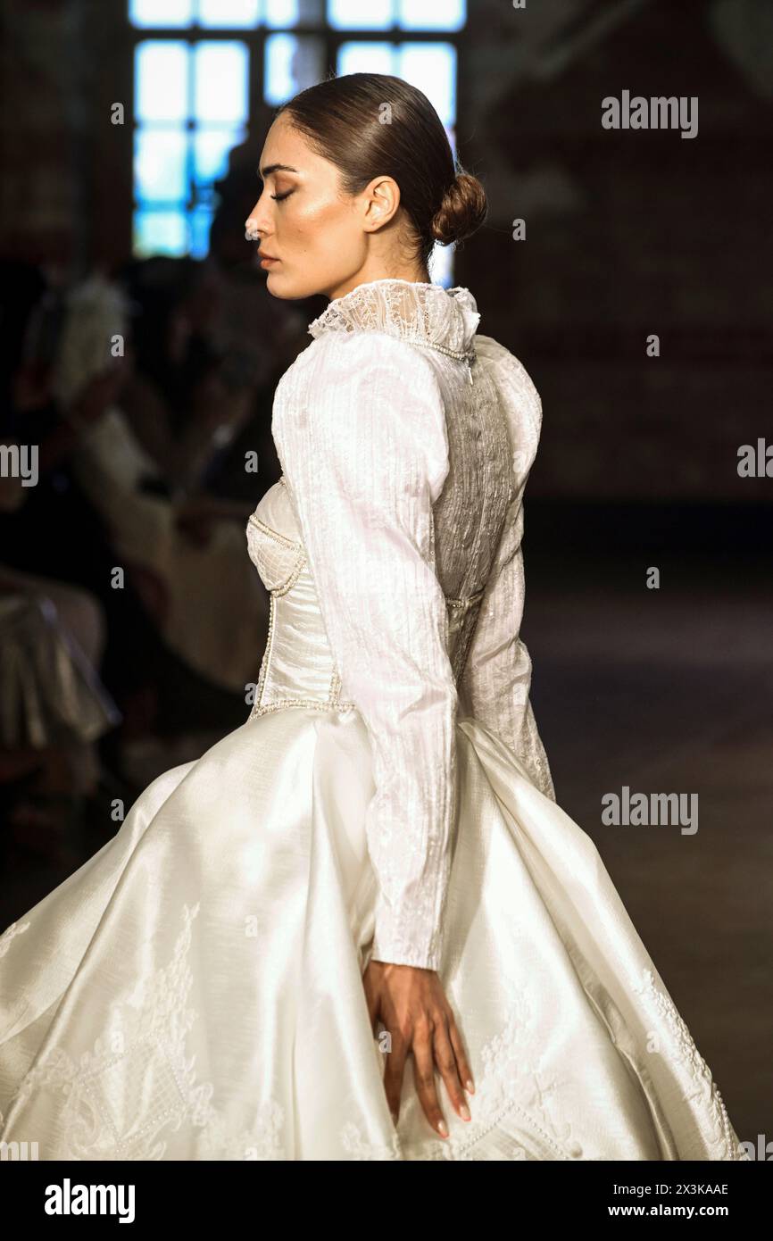 Istanbul, Turkey. 26th Apr, 2024. A model seen wearing a dress by Sineen Haute Couture. On the second day of the Istanbul Modest Fashion Week 2024, the Turkish brand Terzi Dukkani and Serpil, the Palestinian Sineen Haute Couture, the American Citizens of the World, the Nigerian Africa Abaya, and Bangladesh Niharika Momtaz presented their collections in the parade show of Istanbul Modest Fashion Week 2024 in Fisekhane Gallery, Istanbul. (Photo by Valeria Ferraro/SOPA Images/Sipa USA) Credit: Sipa USA/Alamy Live News Stock Photo