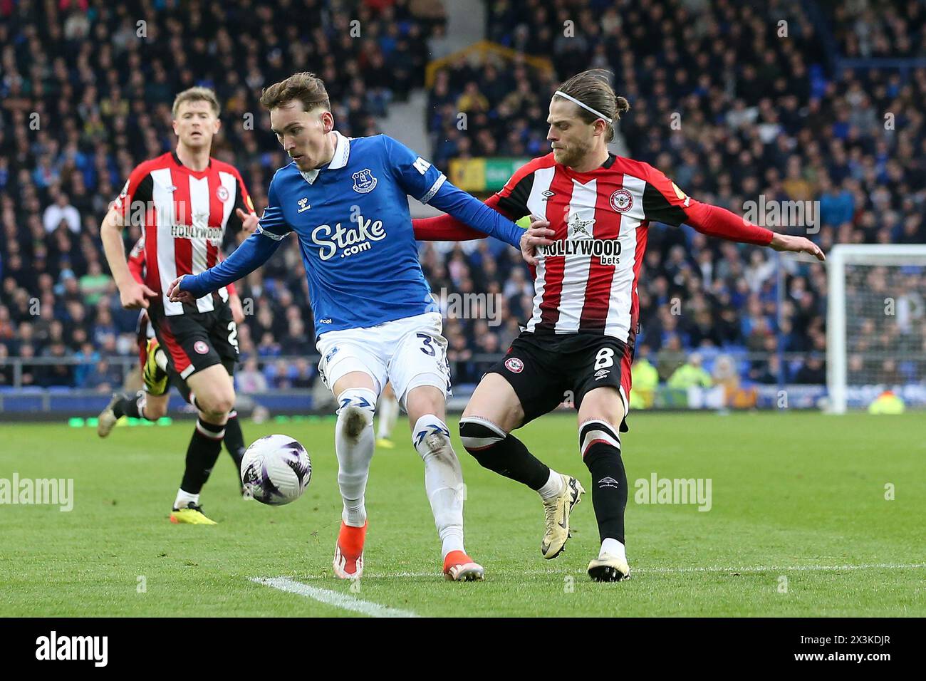 Liverpool, UK. 27th Apr, 2024. James Garner of Everton (l0 and Mathias Jensen of Brentford in action. Premier League match, Everton v Brentford at Goodison Park in Liverpool on Saturday 27th April 2024. this image may only be used for Editorial purposes. Editorial use only, pic by Chris Stading/Andrew Orchard sports photography/Alamy Live news Credit: Andrew Orchard sports photography/Alamy Live News Stock Photo