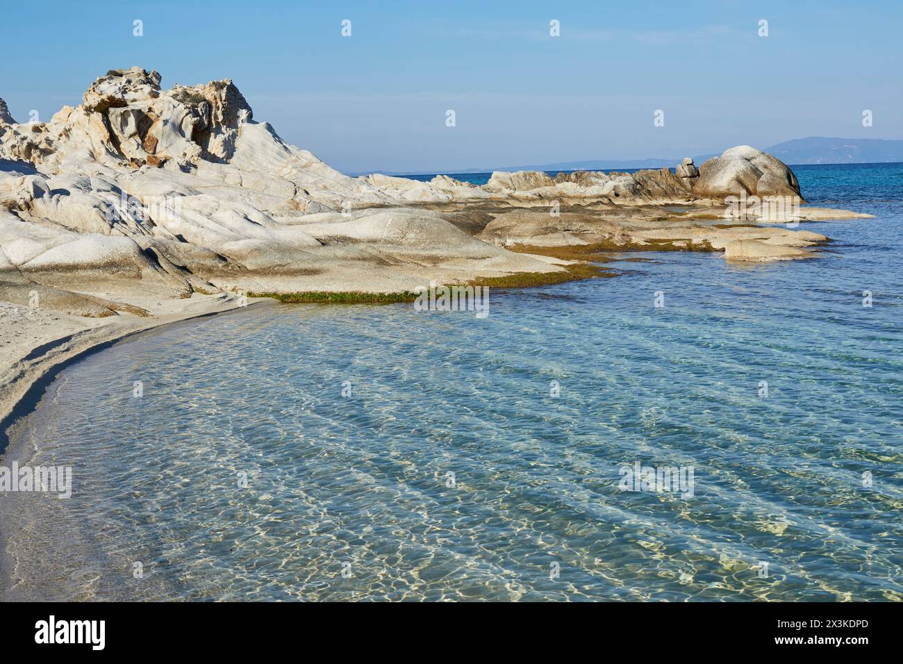 Beach with rocks in chalkidiki Greece Stock Photo - Alamy