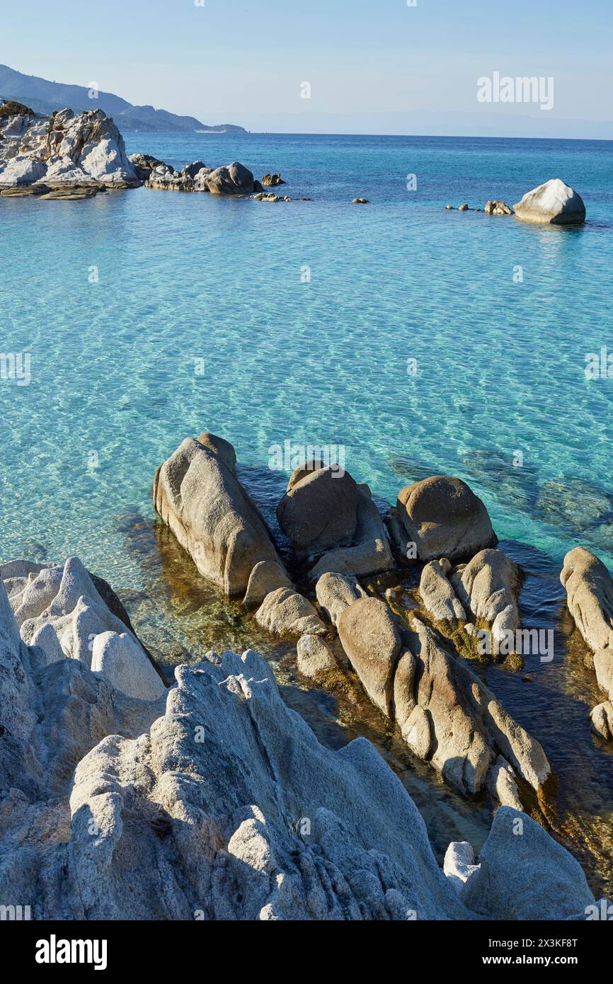 Beach with rocks in chalkidiki Greece Stock Photo - Alamy