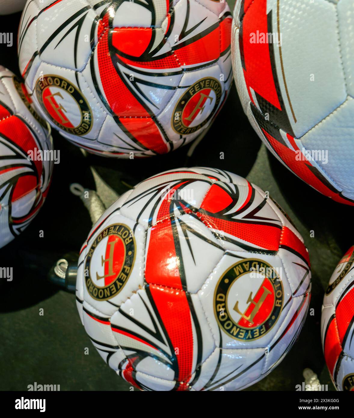 Balls on sale in the fan shop of De Kuip arena - the official playgrounds of FC Feyenoord Stock Photo