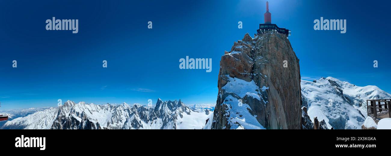 Haute-Savoie, France: panoramic view of L’Aiguille du Midi, the highest spire of the Aiguilles de Chamonix, with view of the Mont Blanc massif peaks Stock Photo