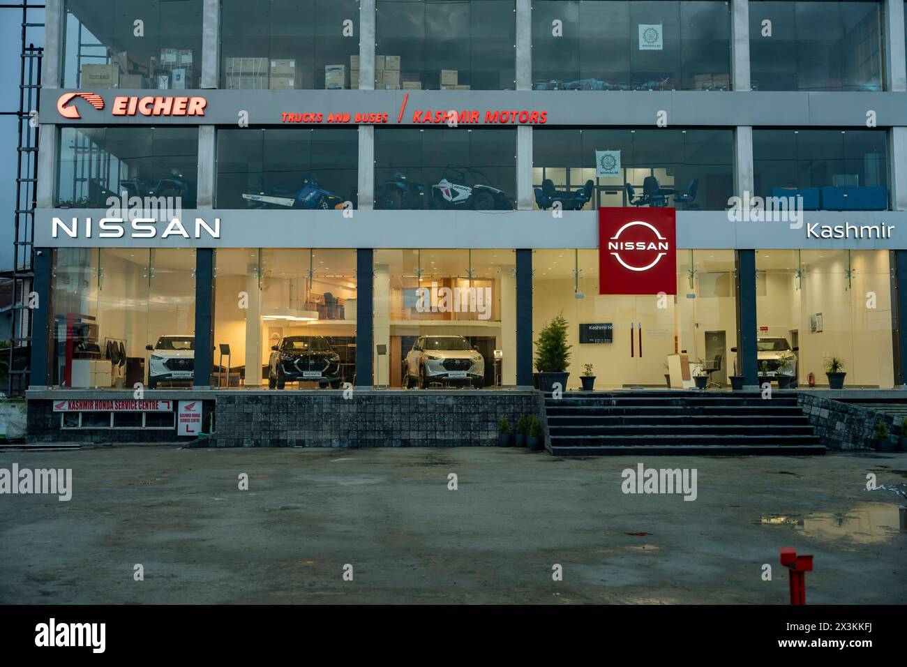 Nissan SUV Cars are seen on display inside a Nissan showroom. Stock Photo