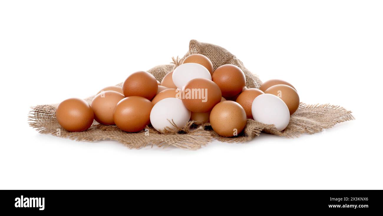 Fresh chicken eggs and burlap fabric isolated on white Stock Photo - Alamy