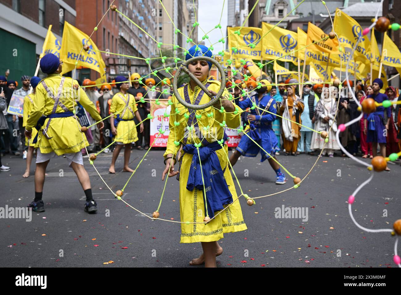Participants march in the Sikh Cultural Society's Sikh Day Parade on April 27, 2024 in New York
