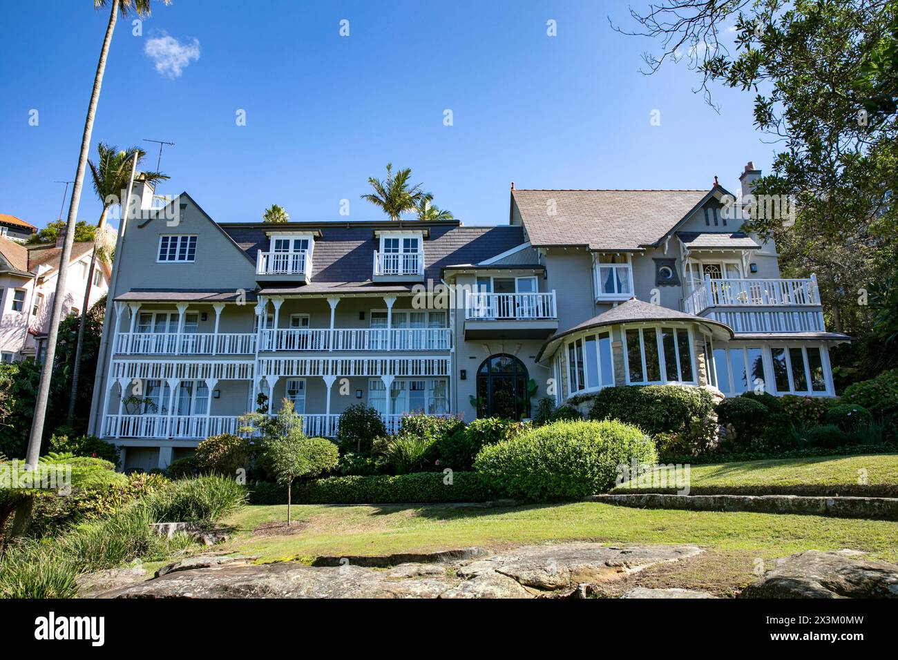 Arts and Crafts architectural style family home on Cremorne Point overlooking Mosman Bay, viewed from the cremorne foreshore walk,Sydney,NSW,Australia Stock Photo
