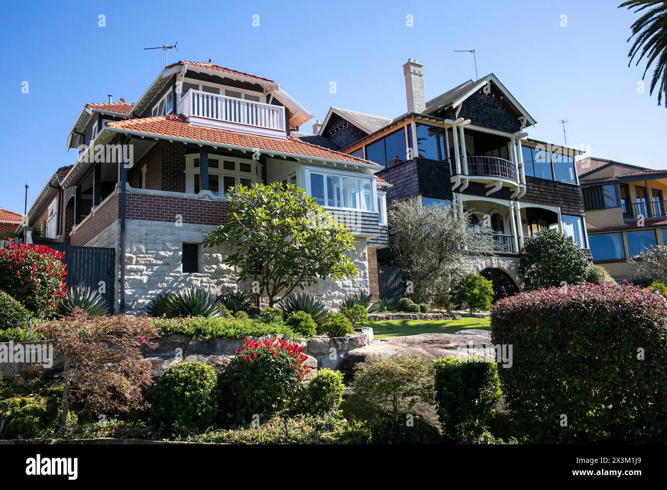 Arts and Crafts architectural style family home on Cremorne Point overlooking Mosman Bay, viewed from the cremorne foreshore walk,Sydney,NSW,Australia Stock Photo