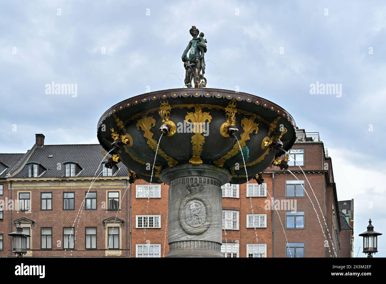 Copenhagen, Denmark - Jul 17, 2023: Caritas Fountain on Gammeltorv in Copenhagen, Denmark Stock Photo