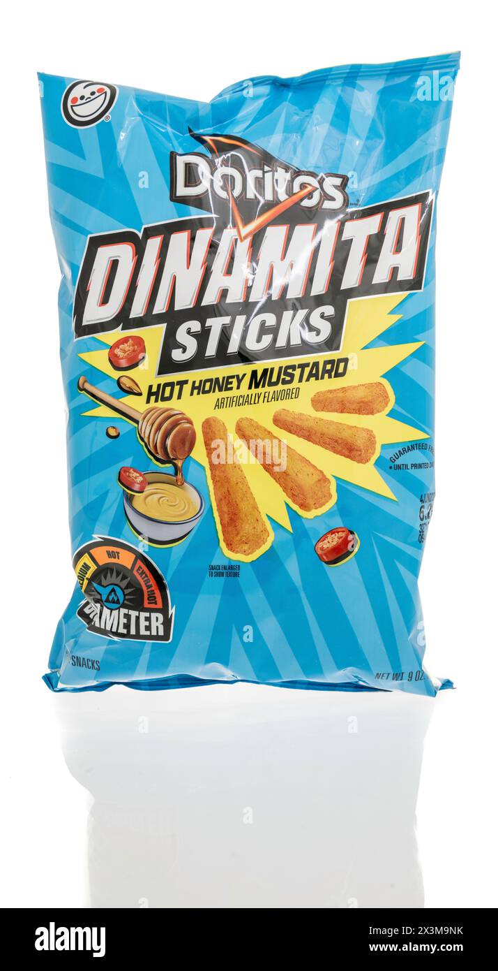 Winneconne, WI - 27 April 2024: A package of Doritos dinamita sticks hot honey mustard on an isolated background. Stock Photo