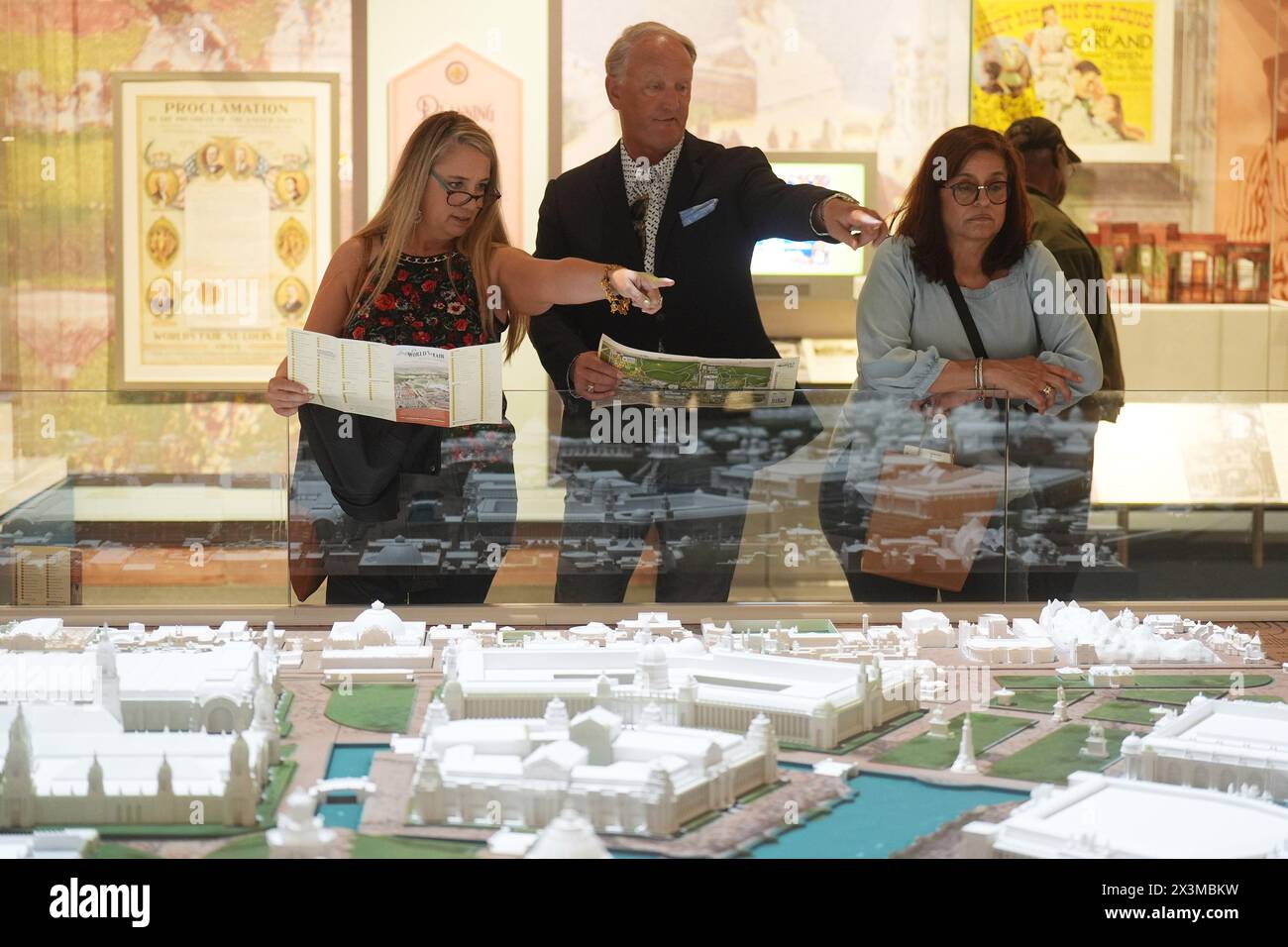 St. Louis, United States. 27th Apr, 2024. Visitors to the opening day of the 1904 Worlds Fair display at the Missouri History Museum point to interesting areas of the fair while looking at a scale model in St. Louis on Saturday, April 27, 2024. The History Museum is celebrating the 120th anniversary of the fair with a scale model of the fair grounds that covered over two square miles in St. Louis and actual items displayed at the fair. Photo by Bill Greenblatt/UPI Credit: UPI/Alamy Live News Stock Photo
