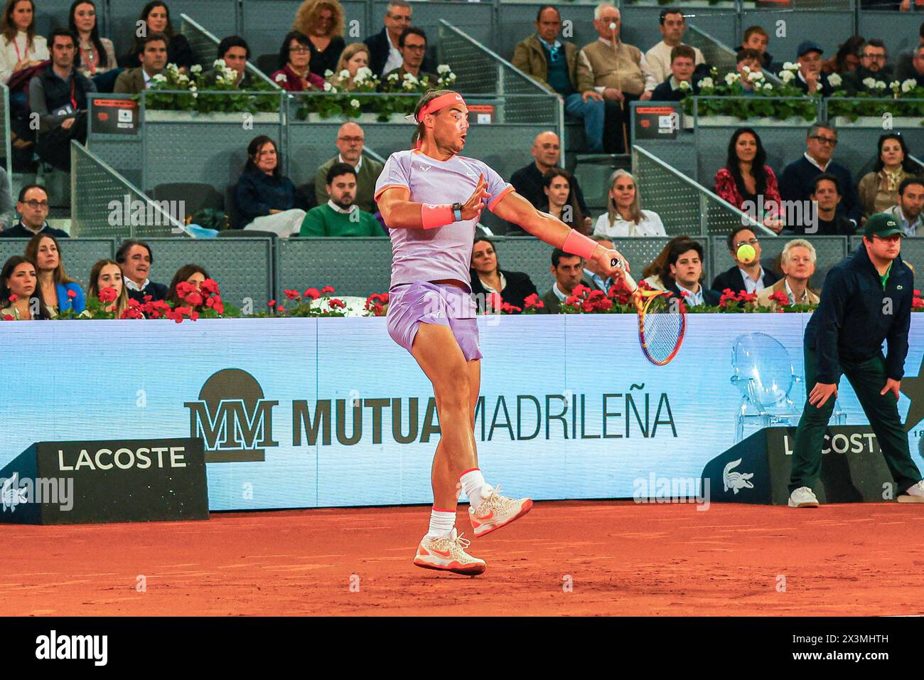 Usera, Spain. 27th Apr, 2024. Rafael Nadal of Spain plays against Alex de Minaur of Australia (not pictured) on Day Six of the Mutua Madrid Open 2024 tournament at La Caja Magica. (Photo by Miguel Reis/SOPA Images/Sipa USA) Credit: Sipa USA/Alamy Live News Stock Photo