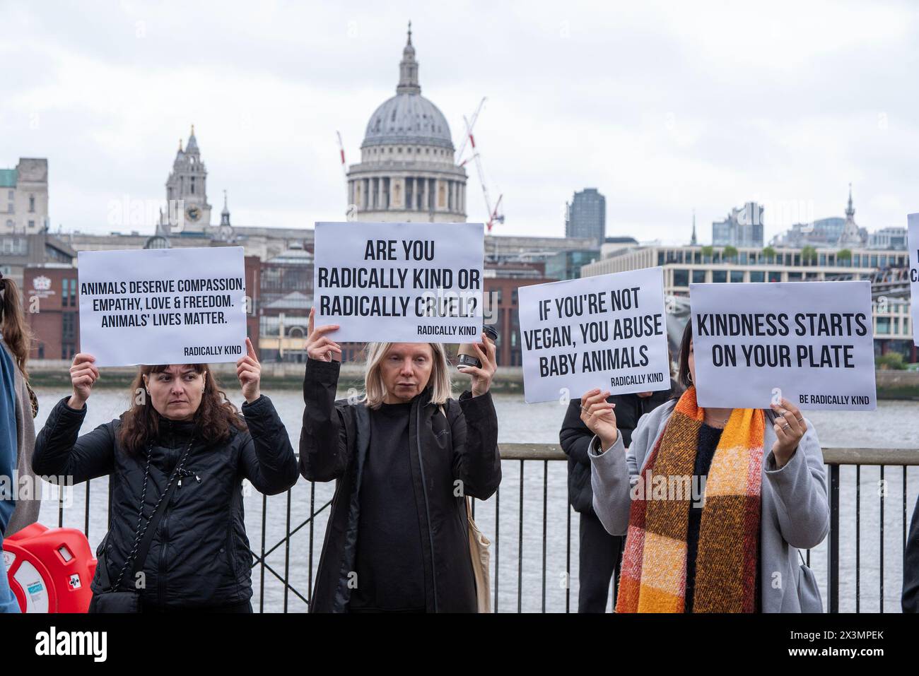 London, UK. 27th Apr, 2024. Protesters hold placards during the demonstration. Radically Kind is vegan organisation. They believe in animal rights and they want to stop animal suffering. They staged a protest outside the Tate Modern in London to make the people realise they eat baby animals very often. Credit: SOPA Images Limited/Alamy Live News Stock Photo