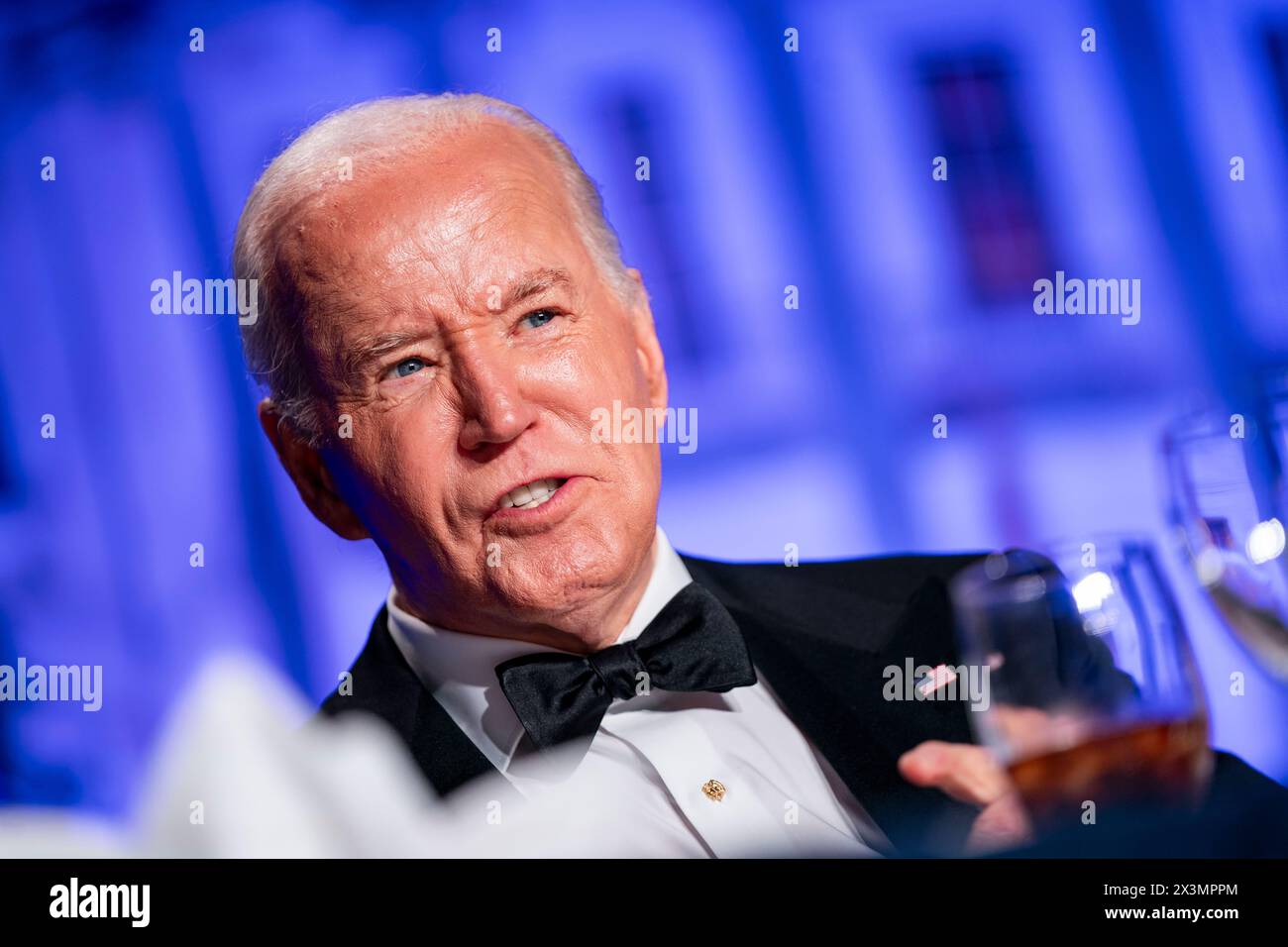 United States President Joe Biden looks on during the White House Correspondents Dinner at the Washington Hilton in Washington, DC on Saturday, April 27, 2024. Credit: Bonnie Cash/Pool via CNP/MediaPunch Stock Photo