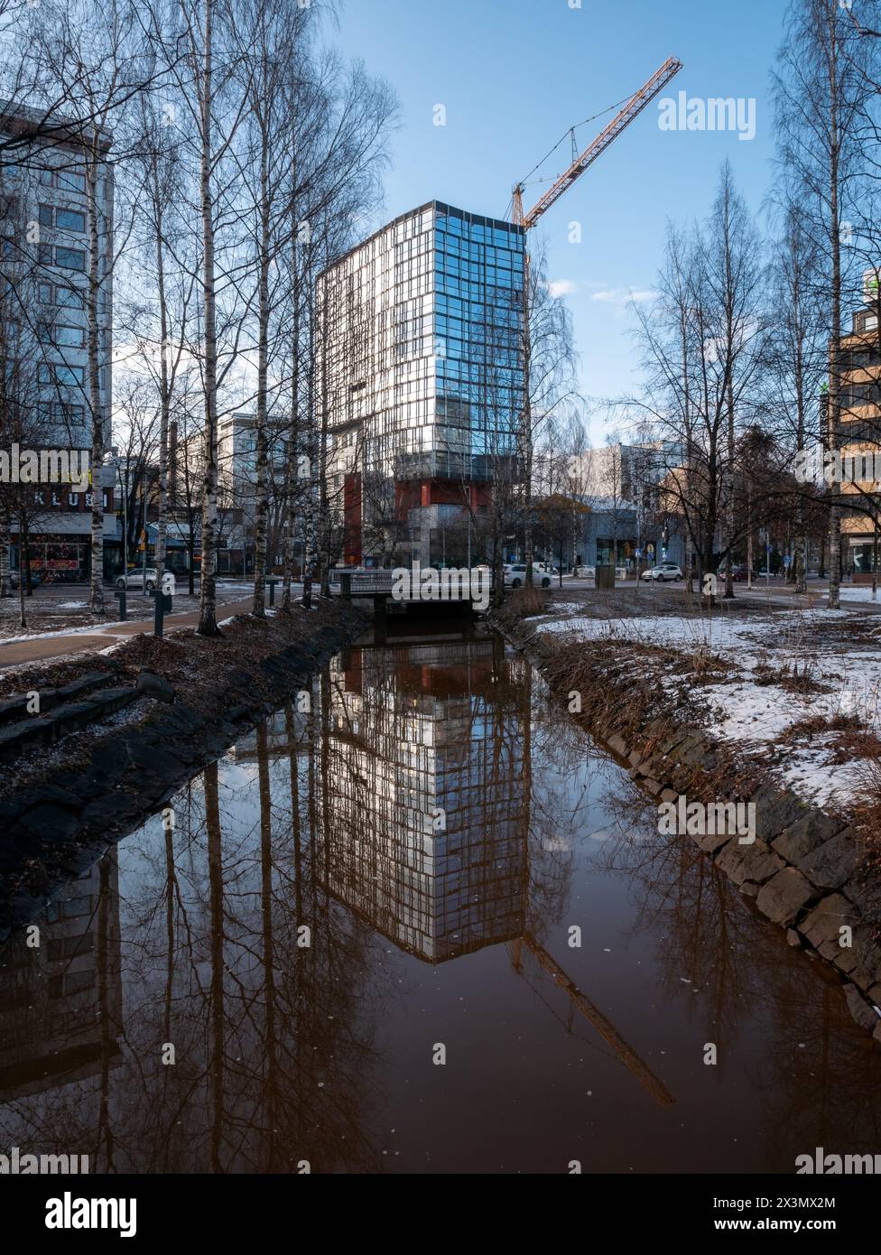 City park scene in late April in Oulu Finland Stock Photo