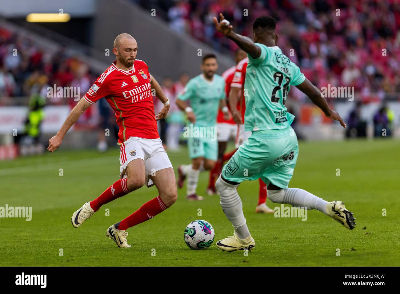 Lisbon, Portugal. 27th Apr, 2024. Fredrik Aursnes (L) of SL Benfica and Cristian Borja (R) of SC Braga seen in action during the Liga Portugal Betclic football match between SL Benfica and SC Braga at Estadio da Luz Stadium. (Final score: SL Benfica 3 - 1 SC Braga) Credit: SOPA Images Limited/Alamy Live News Stock Photo