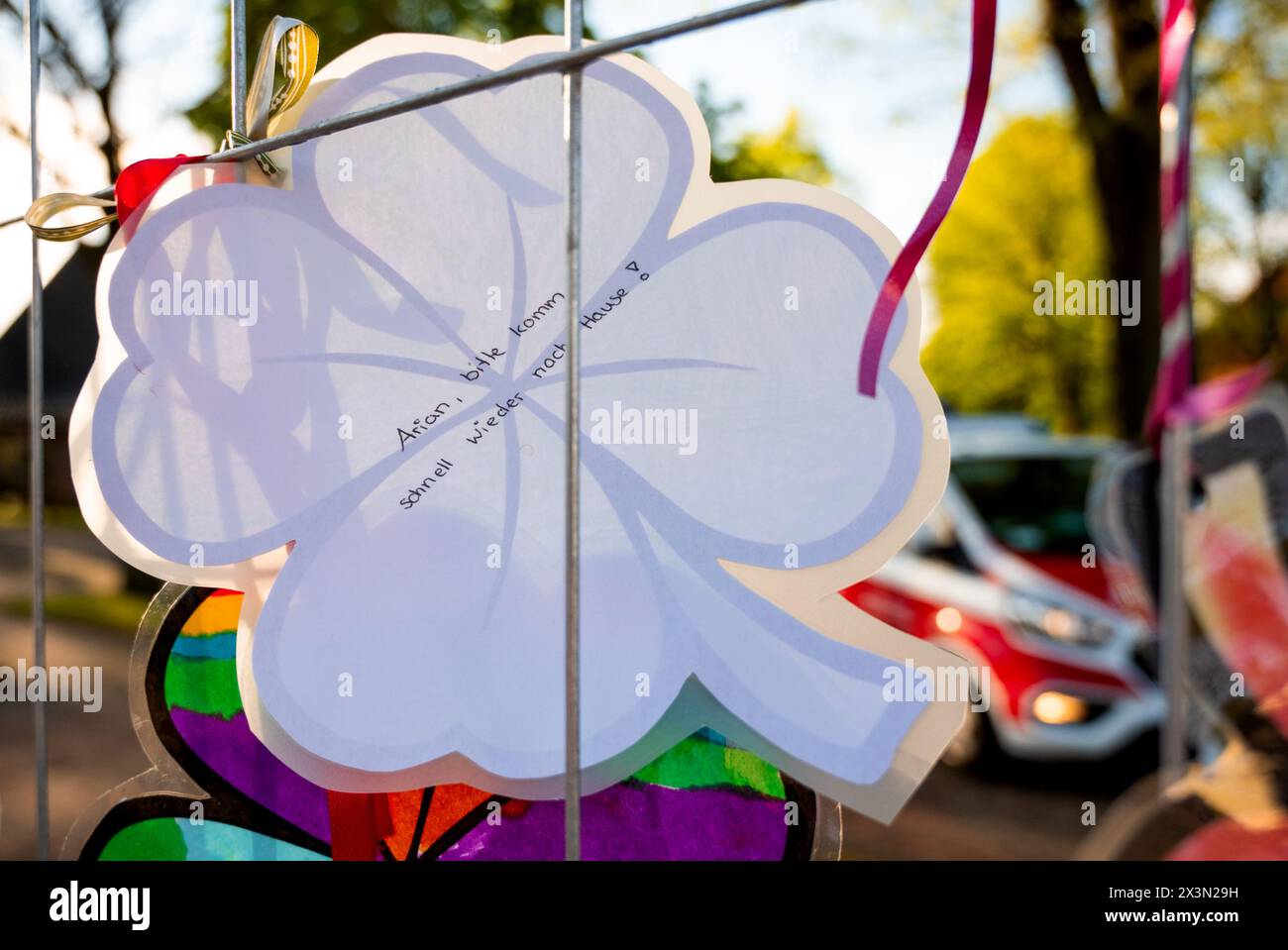 Elm, Germany. 28th Apr, 2024. 'Arian, please come home quickly' is written on a shamrock made by children from a kindergarten. Six-year-old Arian from Elm is still missing. The search for him continues. Credit: Daniel Bockwoldt/dpa/Alamy Live News Stock Photo