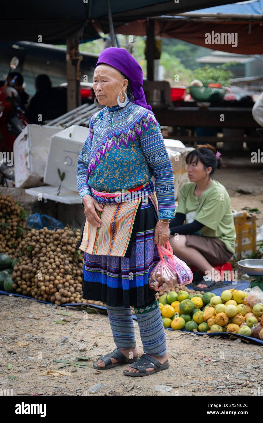 Flower Hmong woman at the Can Cau Market in Lao Cai Province, Vietnam Stock Photo