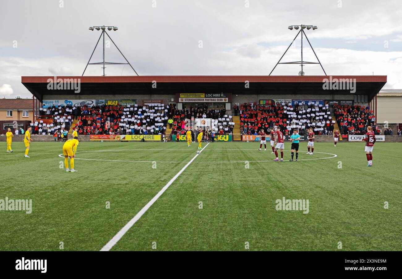 Ochilview Park, Falkirk, UK. 27th Apr 2024. 27/04/2024 - Stenhousemuir fans in the Norway Stand at Ochilview Park, Stenhousemuir, display a TIFO ahead of kick off to celebrate their team winning the Cinch Scottish League Two title, the first time the club have won the league in their 140 year history. Credit: Thomas Gorman/Alamy News Live Stock Photo