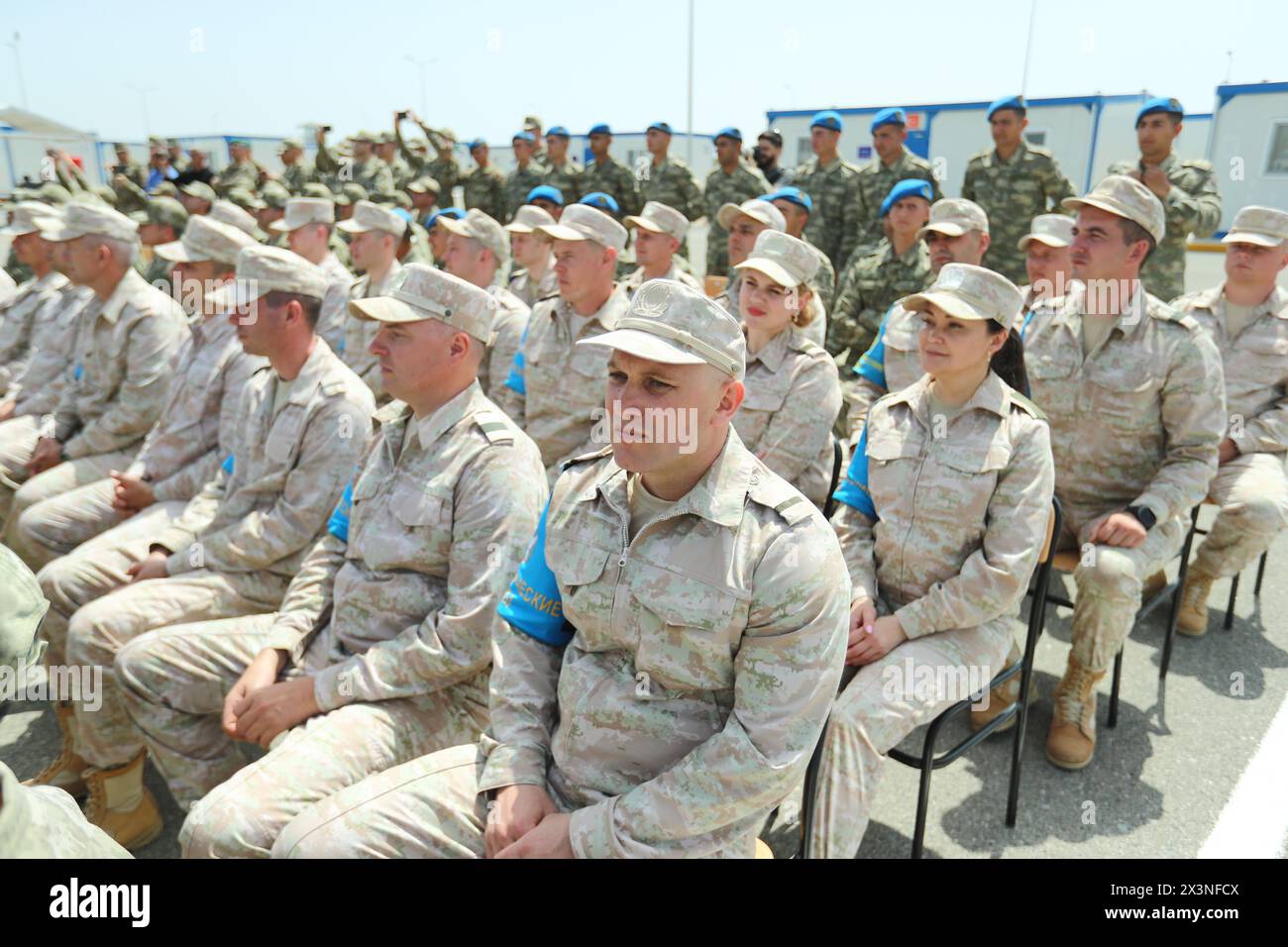 Goranboy, Azerbaijan. 27th Apr, 2024. Russian service members attend a ceremony closing the Turkish-Russian Joint Monitoring Centre in the course of peacekeeping troops' withdrawal from the territory of Karabakh region and areas nearby, in Aghdam District on April 26, 2024. Credit: SOPA Images Limited/Alamy Live News Stock Photo