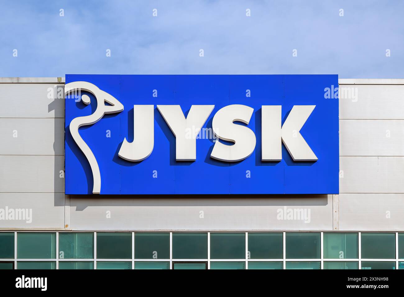 Novi Sad, Serbia - April 23, 2024: Jysk storefront logo sign. Jysk is largest Danish retailer operating in 51 countries, selling household goods, furn Stock Photo