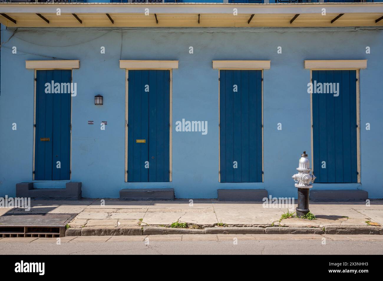 French Quarter, New Orleans, Louisiana.  Shotgun-Style House.  Duplex, Two Doors, Two Windows. Stock Photo