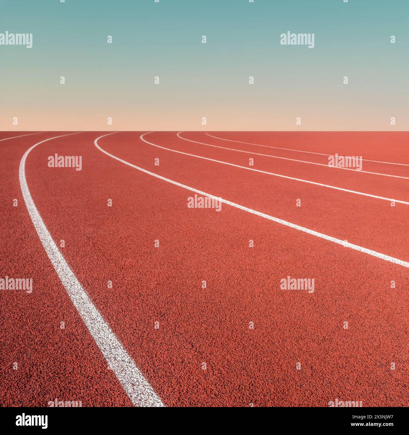 Conceptual Image Of Sports Ground Running Race White Markings And A Distant Sunset Stock Photo
