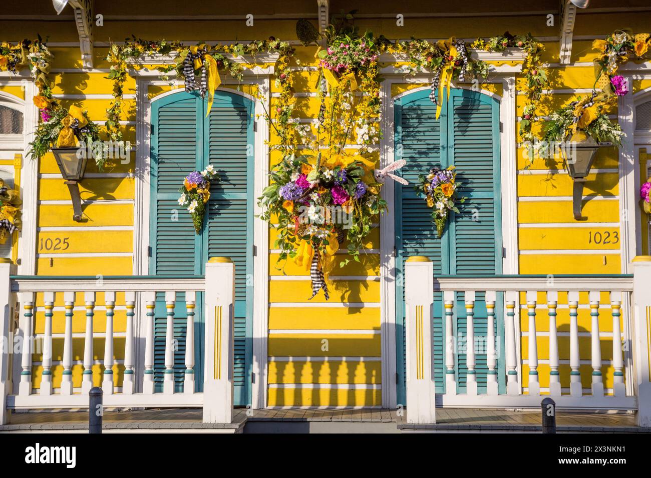 New Orleans, Louisiana. French Quarter, Shotgun-style House with Floral Decorations. Stock Photo