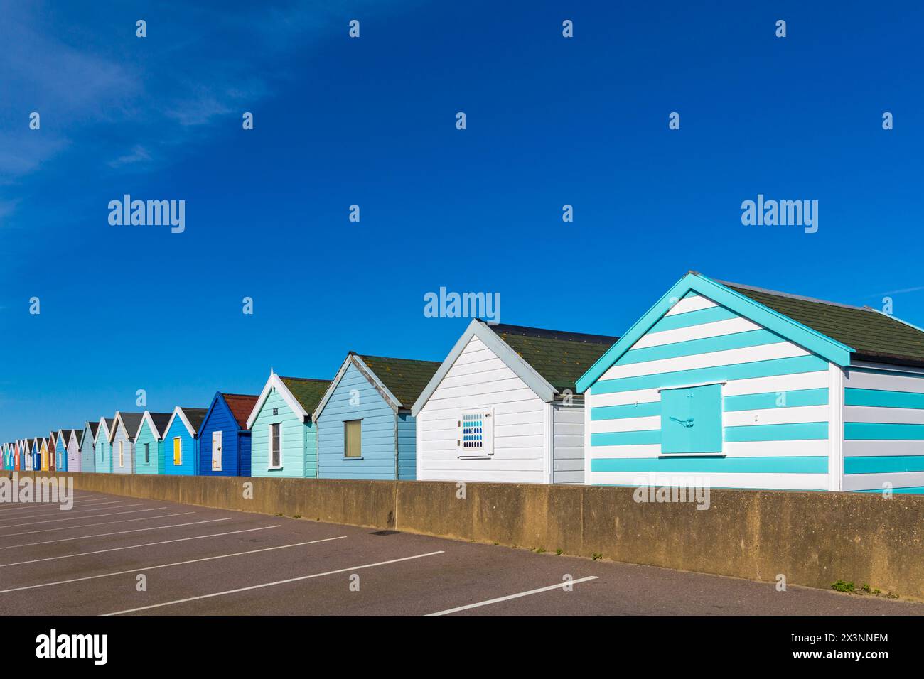 Row of colourful beach huts at Southwold, Suffolk, UK in April Stock Photo