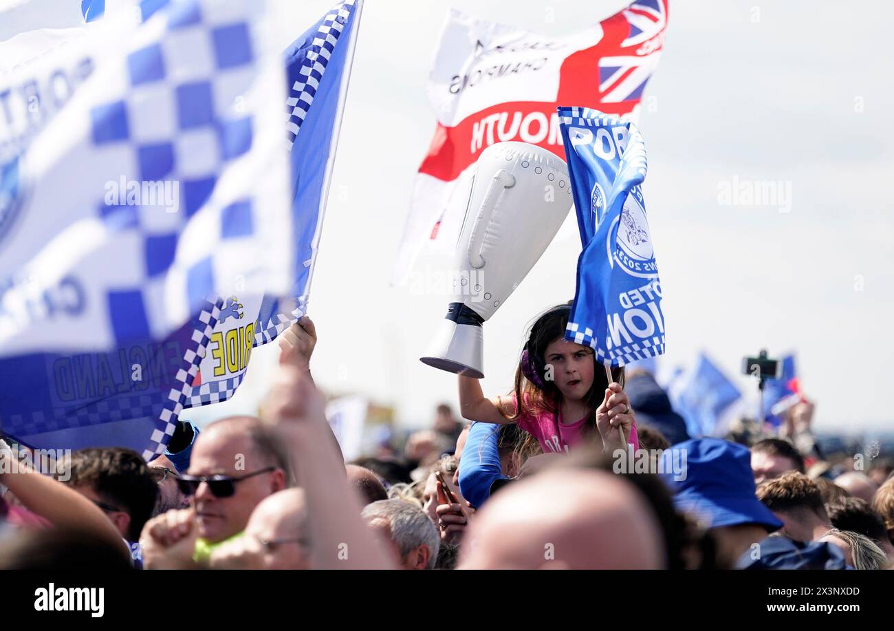 Portsmouth supporter during a celebration event at Southsea Common in Portsmouth to celebrate winning the Sky Bet League One title. Picture date: Sunday April 28, 2024. Stock Photo