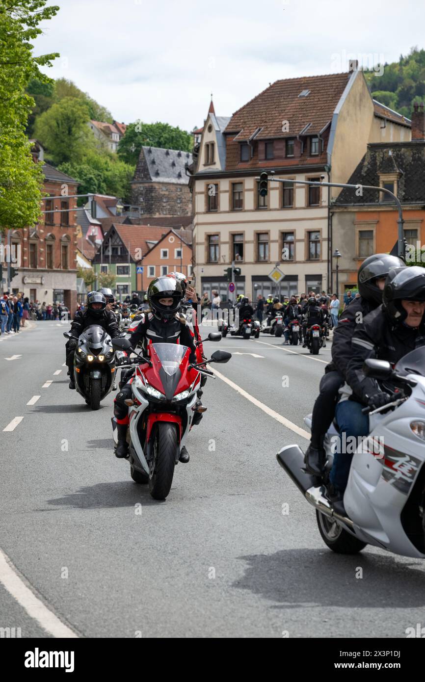 Kulmbach, Germany. 28th Apr, 2024. Numerous motorcycles ride in a parade through Kulmbach town center. Every year at the end of April, thousands of motorcyclists come together in Kulmbach for the biggest biker meeting in southern Germany to kick off the motorcycle season. Credit: Pia Bayer/dpa/Alamy Live News Stock Photo