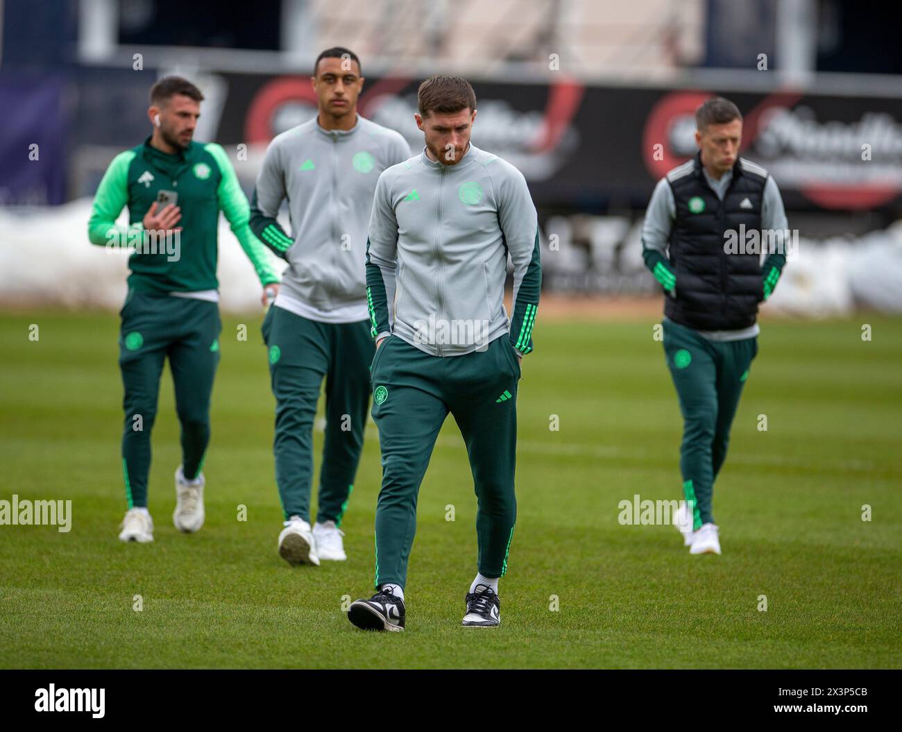 Dens Park, Dundee, UK. 28th Apr, 2024. Scottish Premiership Football, Dundee versus Celtic; Celtic players led by Anthony Ralston of Celtic check out the playing surface Credit: Action Plus Sports/Alamy Live News Stock Photo