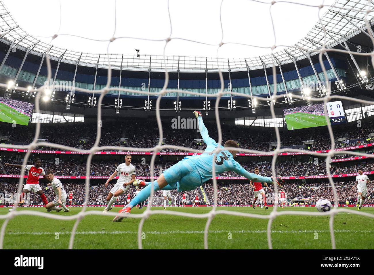 Tottenham Hotspur Stadium, London, UK. 28th Apr, 2024. Premier League Football, Tottenham Hotspur versus Arsenal; Bukayo Saka of Arsenal shoots and scores his sides 2nd goal in the 27th minute to make it 0-2 captured with a remote camera behind the net Credit: Action Plus Sports/Alamy Live News Stock Photo
