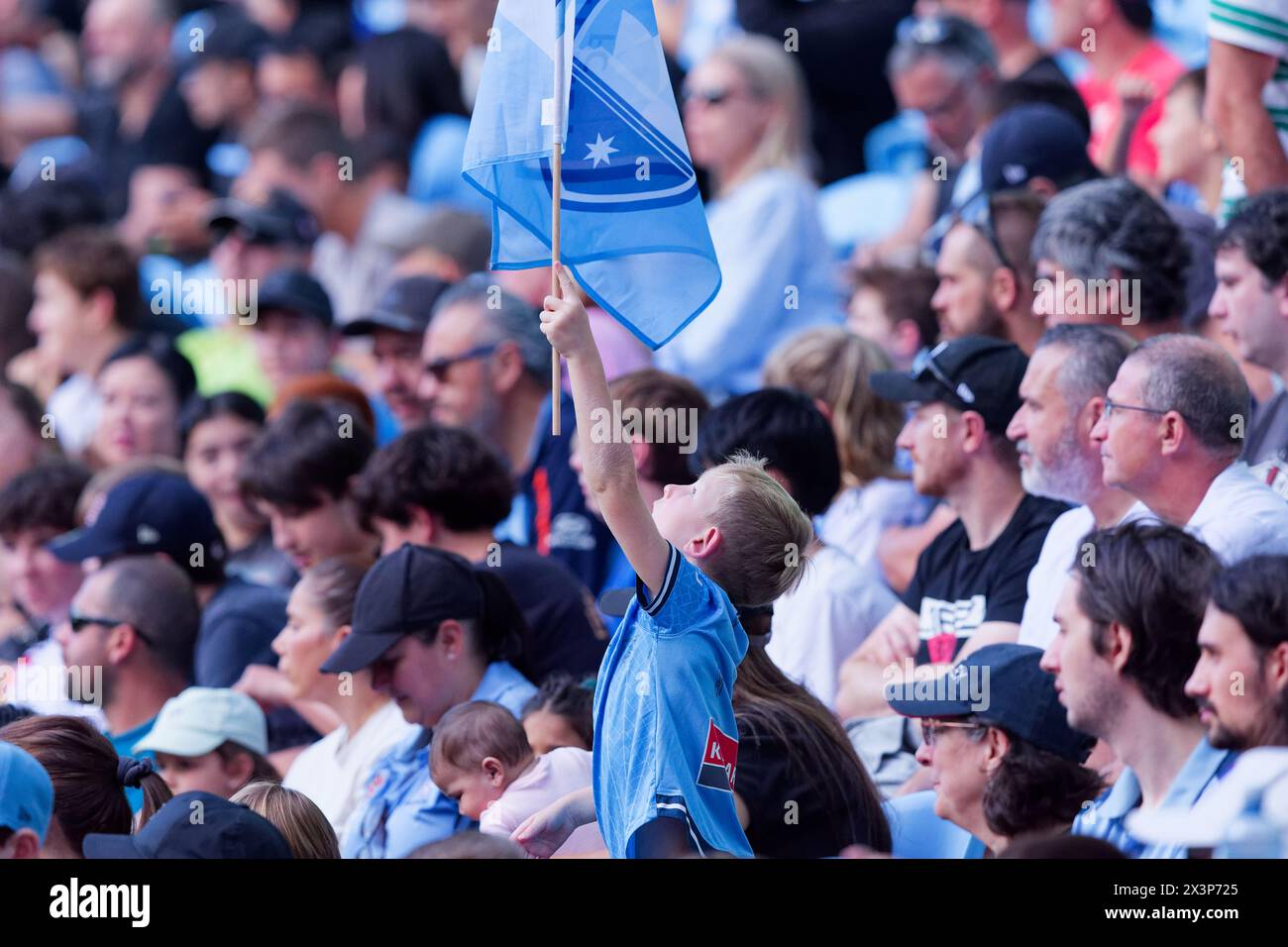 Sydney, Australia. 28th Apr, 2024. A young Sydney FC fan showing his support during the A-League Men Rd26 match between Sydney FC and Perth Glory at Allianz Stadium on April 28, 2024 in Sydney, Australia Credit: IOIO IMAGES/Alamy Live News Stock Photo