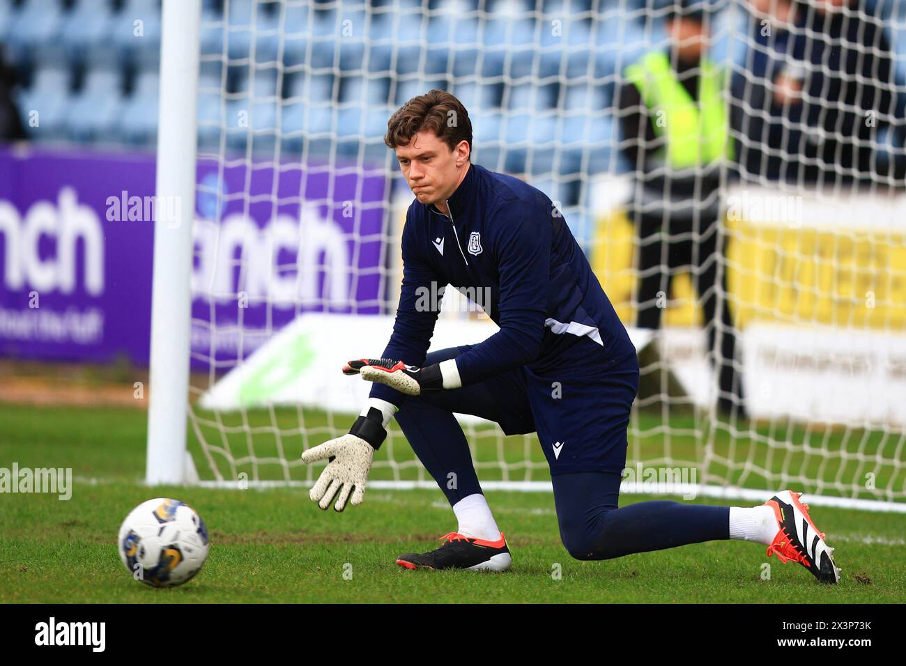 Dens Park, Dundee, UK. 28th Apr, 2024. Scottish Premiership Football, Dundee versus Celtic; Dundee goalkeeper Jon McCracken during the warm up before the match Credit: Action Plus Sports/Alamy Live News Stock Photo