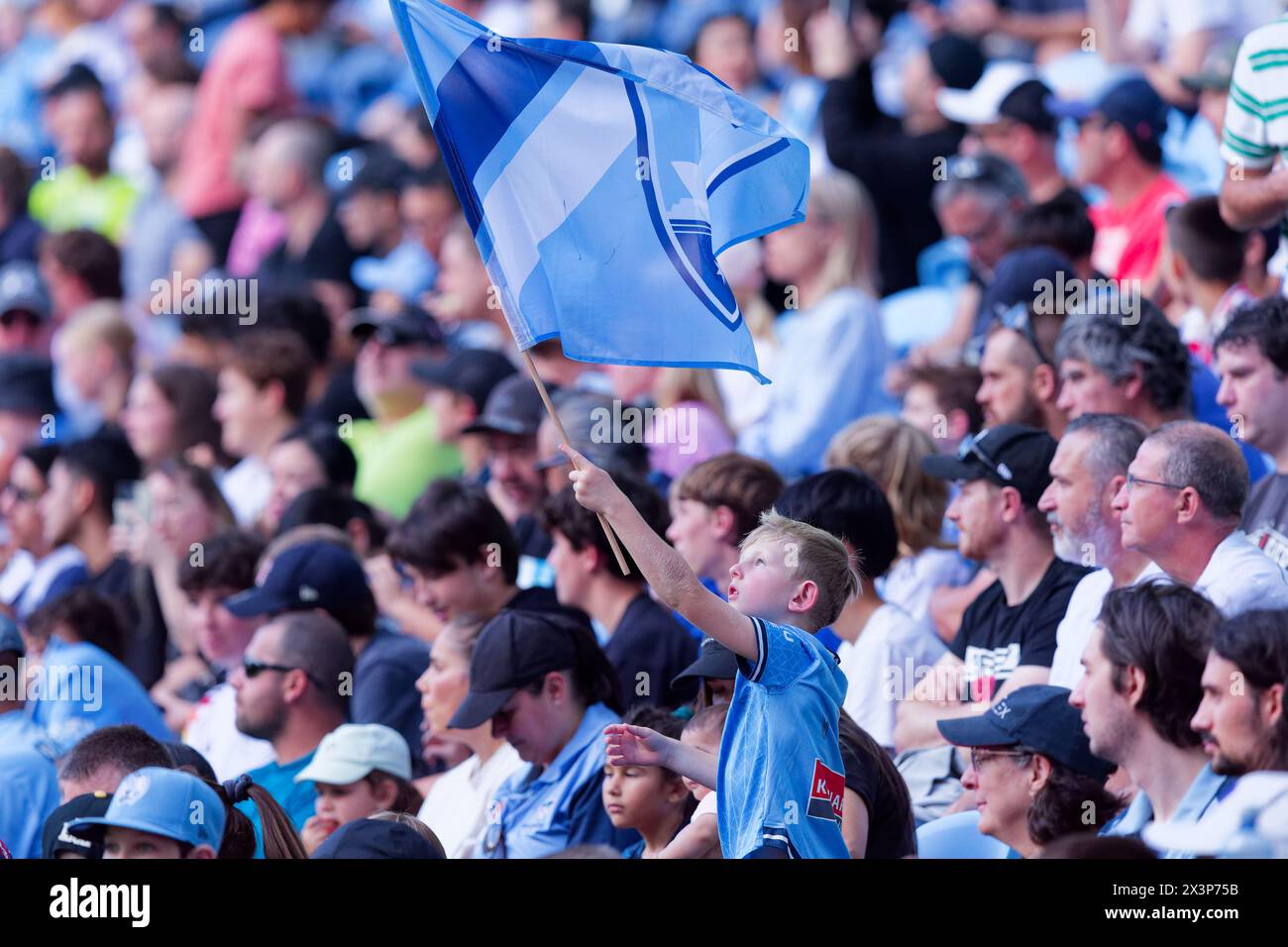Sydney, Australia. 28th Apr, 2024. A young Sydney FC fan showing his support during the A-League Men Rd26 match between Sydney FC and Perth Glory at Allianz Stadium on April 28, 2024 in Sydney, Australia Credit: IOIO IMAGES/Alamy Live News Stock Photo
