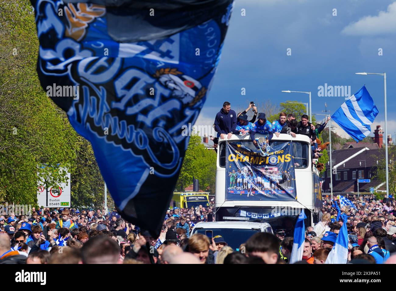 Stockport County Players and fans celebrate during an open-top bus ...