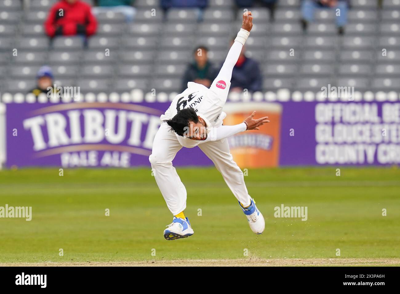 Bristol, UK, 28 April 2024. Gloucestershire's Ajeet Singh Dale bowling during the Vitality County Championship Division Two match between Gloucestershire and Middlesex. Credit: Robbie Stephenson/Gloucestershire Cricket/Alamy Live News Stock Photo