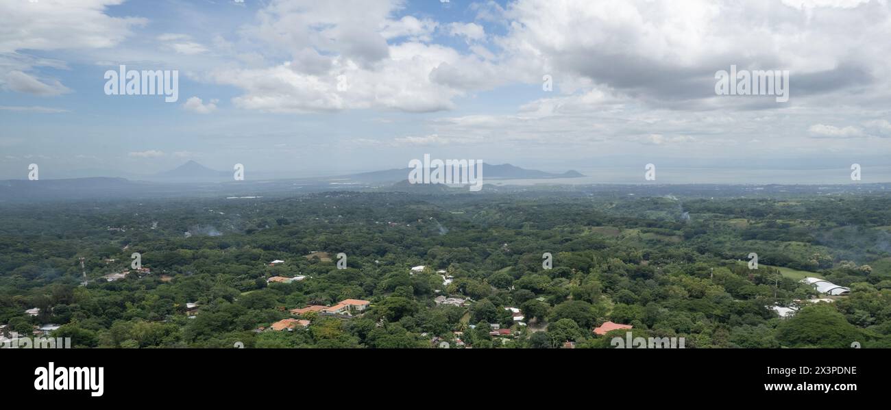 Panorama view on Managua Nicaragua aerial drone view with green jungle background Stock Photo
