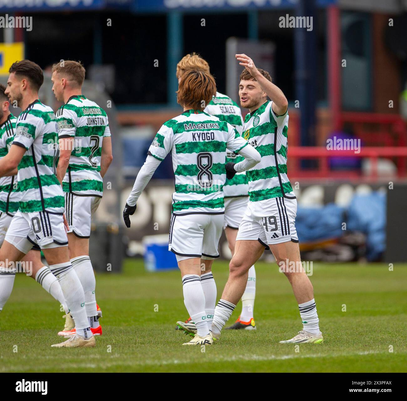 Dens Park, Dundee, UK. 28th Apr, 2024. Scottish Premiership Football, Dundee versus Celtic; James Forrest of Celtic celebrates with Kyogo Furuhashi of Celtic after he scored in the 30th minute to make it 1-0 Credit: Action Plus Sports/Alamy Live News Stock Photo