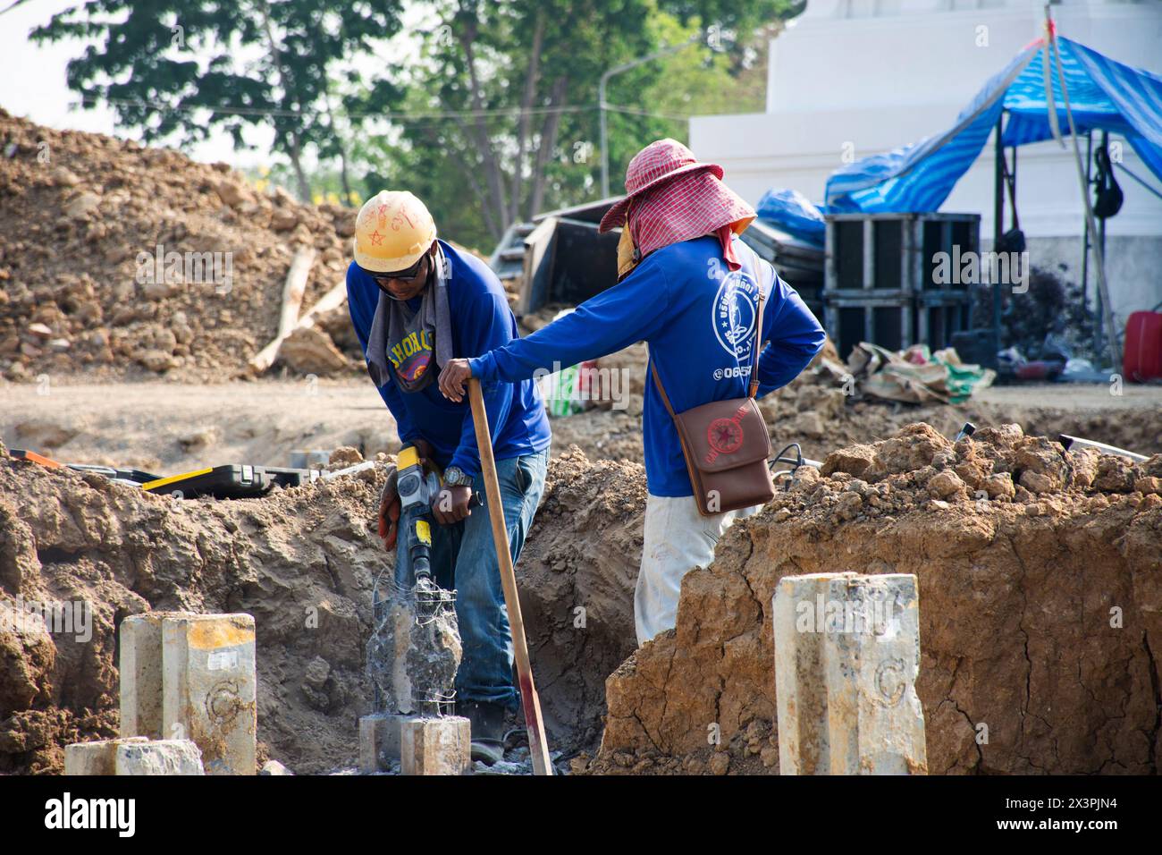 Asian labor people and thai labour workers use machine tool and heavy ...