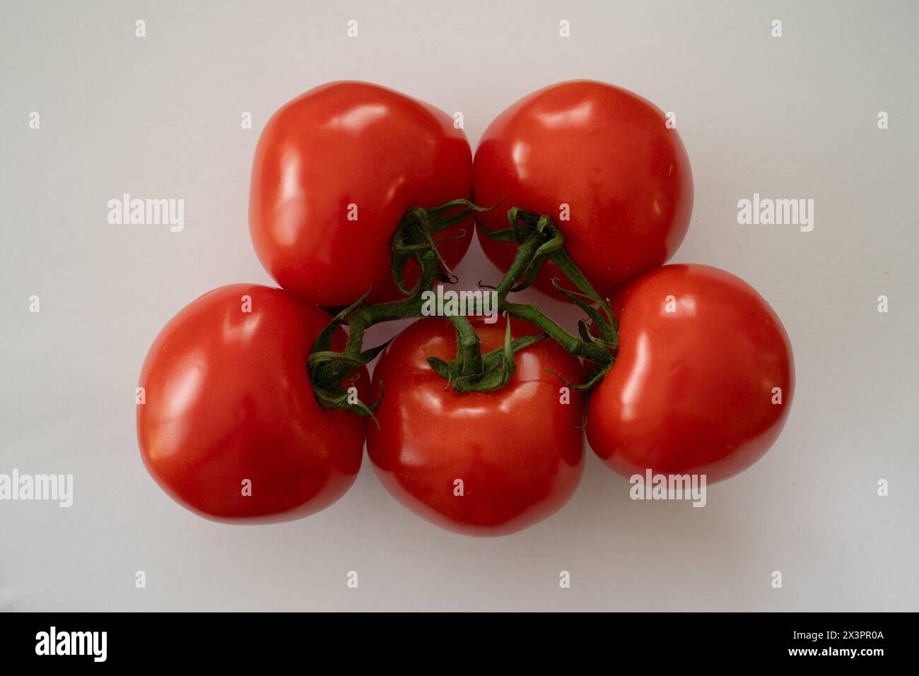 Close up five tomatoes on hi-res stock photography and images - Alamy