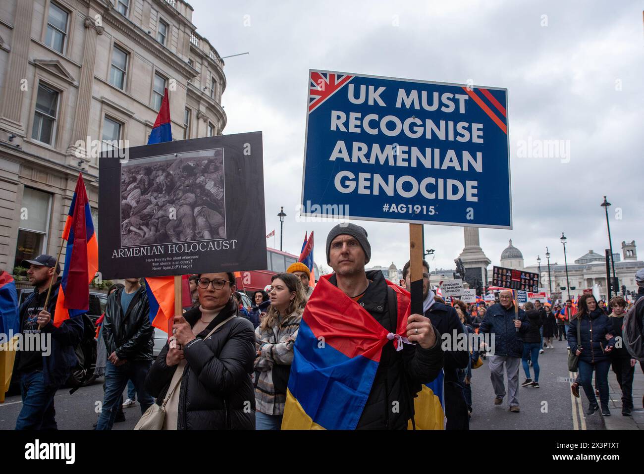 London, UK. 27th Apr, 2024. Protesters march with placards and flags towards the Whitehall in London, UK during the demonstration. The 109th anniversary of the Armenian genocide was commemorated on the April 24th, 2024. And is considered the beginning of the genocide when the Turkish army deported and executed many intellectuals. And an estimate of 1.5 million people were killed. Nowadays, the Turkish government still denys the massacre. Though many countries recognized this first world war act as genocide. Credit: SOPA Images Limited/Alamy Live News Stock Photo