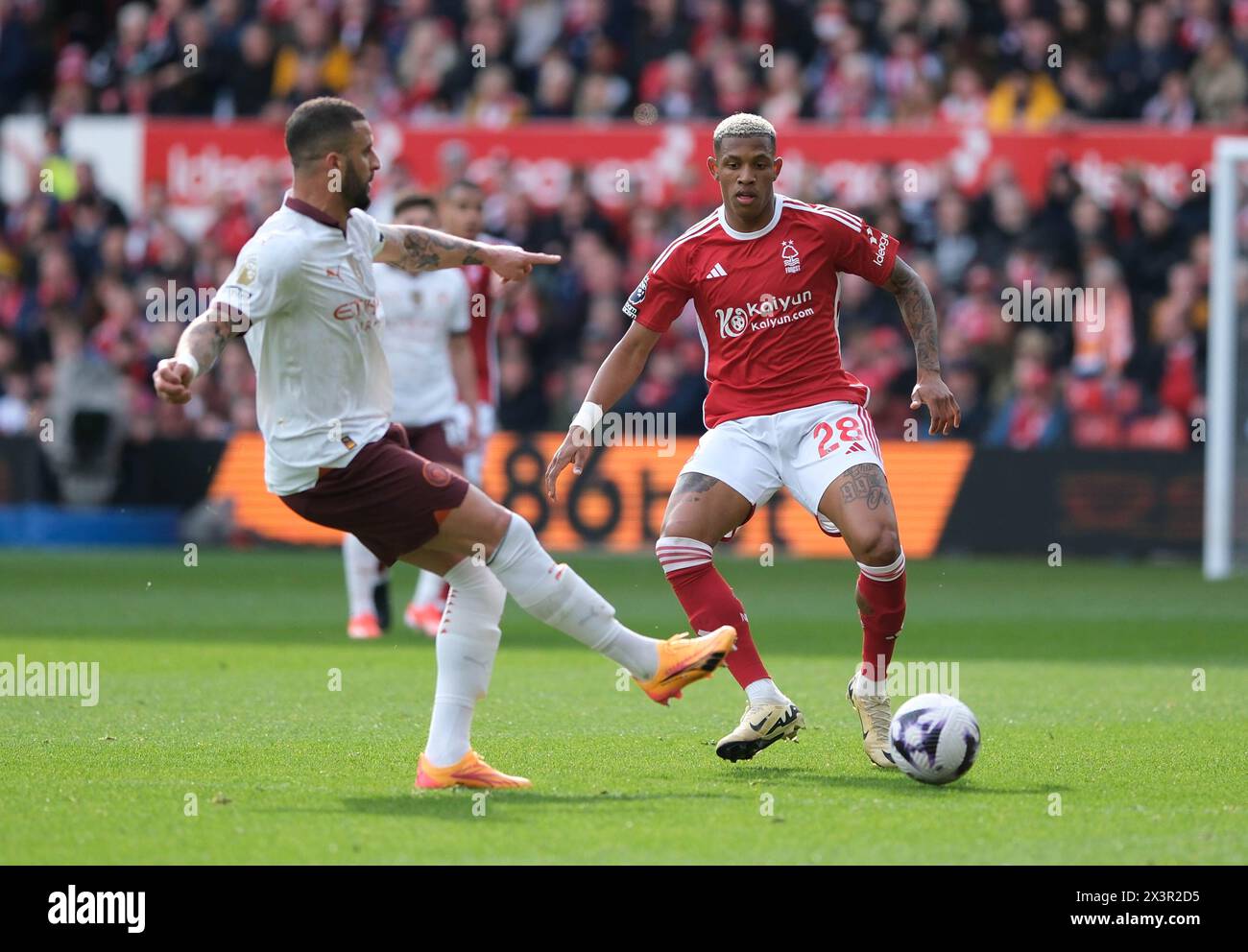 The City Ground, Nottingham, UK. 28th Apr, 2024. Premier League Football, Nottingham Forest versus Manchester City; Kyle Walker of Manchester City under pressure from Danilo of Nottingham Forest Credit: Action Plus Sports/Alamy Live News Stock Photo
