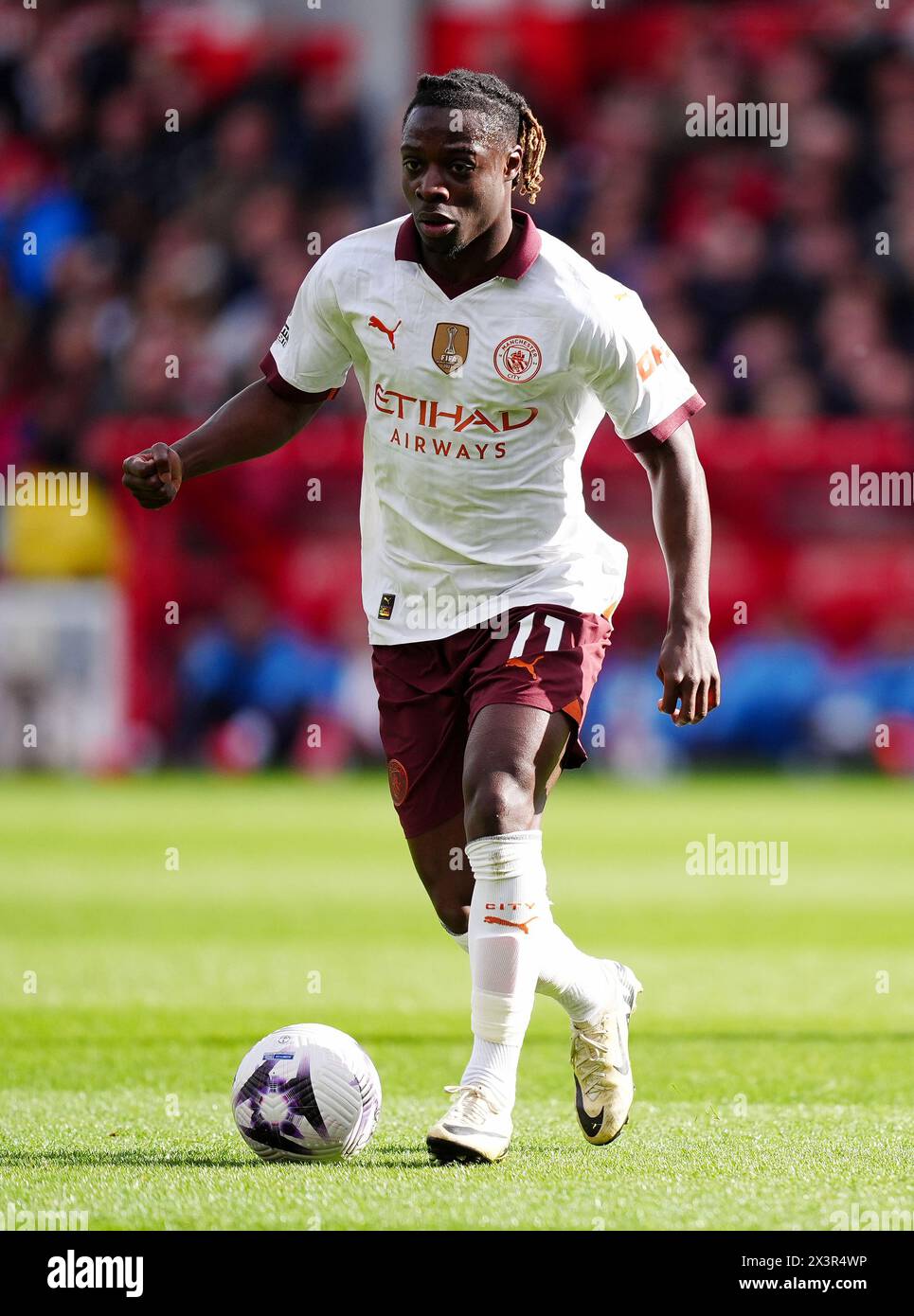 Manchester City's Jeremy Doku during the Premier League match at the City Ground, Nottingham. Picture date: Sunday April 28, 2024. Stock Photo